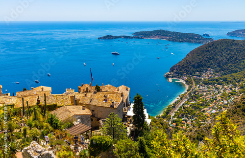 Panoramic view of Eze Bord de Mer  Silva Maris port and St. Jean Cap Ferrat cape seen from historic town of Eze over Azure Cost of Mediterranean Sea in France