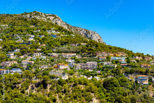 Panoramic view of Eze town valley among Alpes hills and residential area with summer houses and villas on French Riviera Coast of Mediterranean Sea in France © Art Media Factory