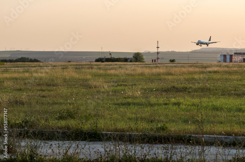 Wallpaper Mural Arriving flight at the airport. Torontodigital.ca