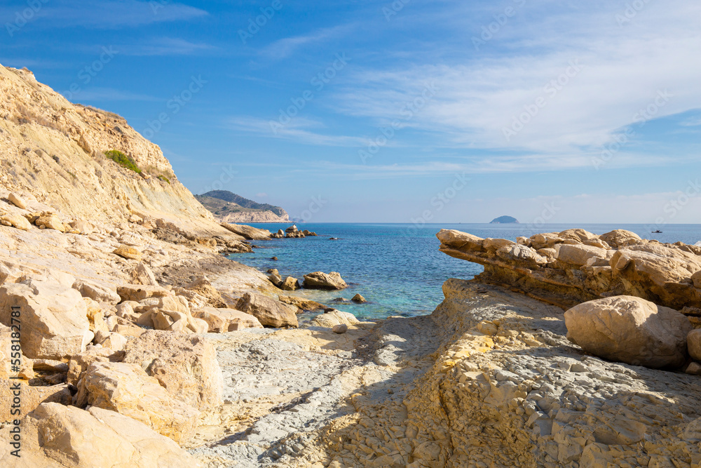 Close-up on rocks, bays, clear sea - natural background, Spain, Costa Blanca