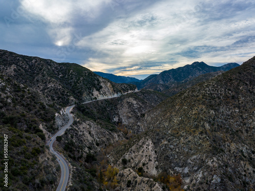 Aerial Vista of Angeles Crest's Mountain Road Unfolding Like a Serpentine Ribbon