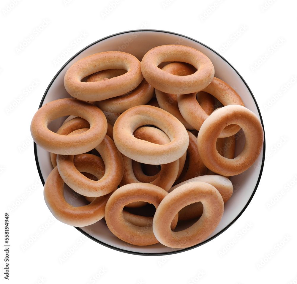 Bowl with tasty dry bagels (sushki) isolated on white, top view Bowl with tasty dry bagels (sushki) isolated on white, top view