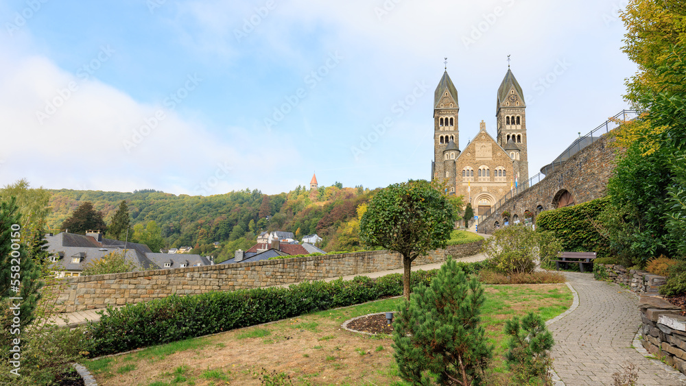 Clervaux, Luxembourg - October 3, 2022: Cityscape with roman catolic church Saints-Come-Et-Damien of Clervaux in Luxembourg