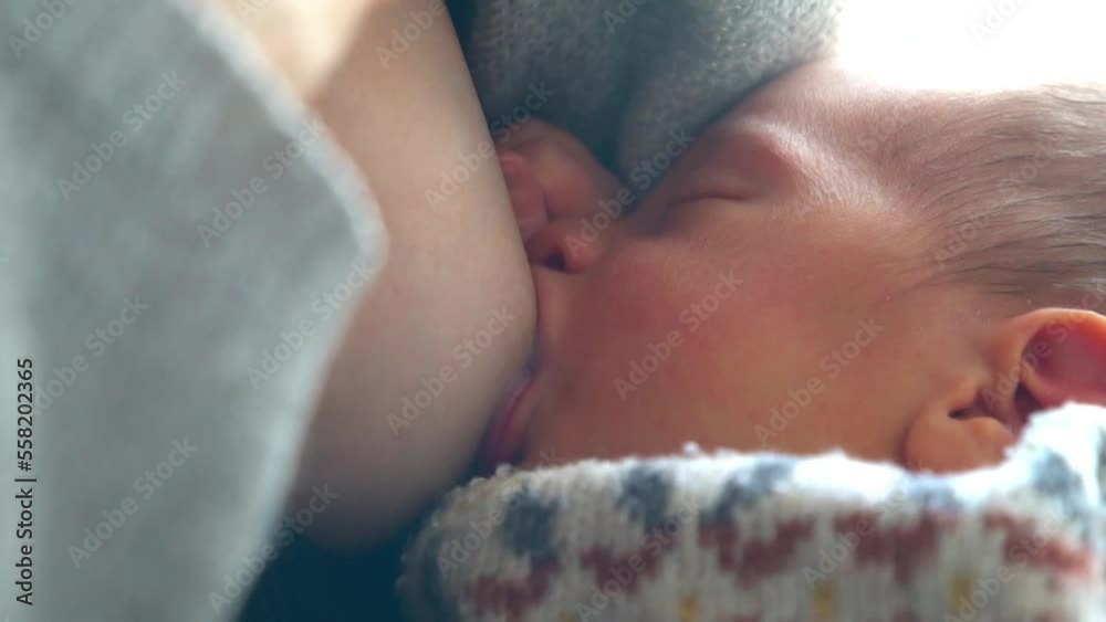 close-up of a newborn baby suckling. breastfeeding