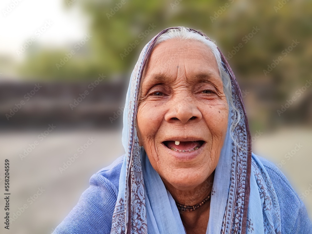 old-lady-woman-of-the-rural-area-of-india-smiling-mother-nanny-and