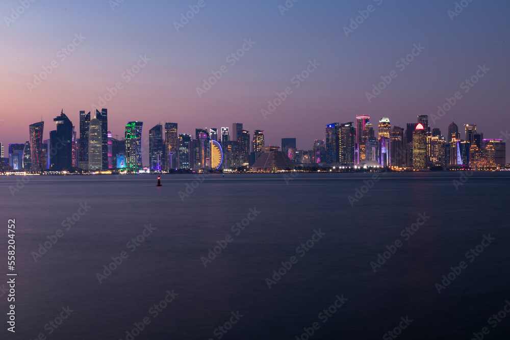 A view of the Doha Corniche and the towers, one of the most beautiful places in Qatar. A picture taken during the blue hour