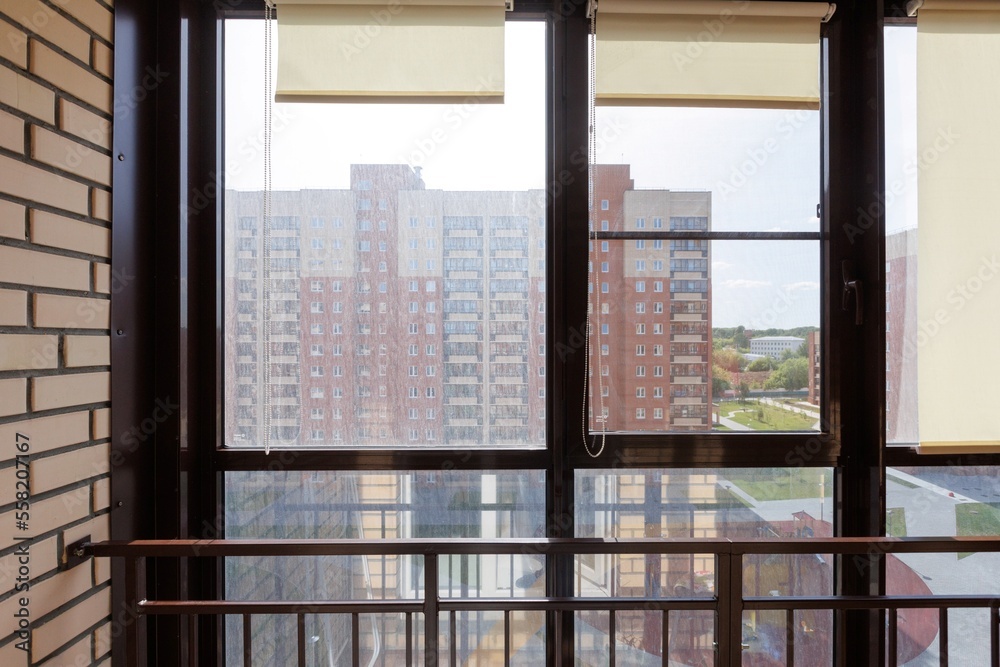 interior decoration of the interior of the balcony of a residential apartment. view from the balcony. interior decoration of the interior of the balcony of a residential apartment. view from the balcony.