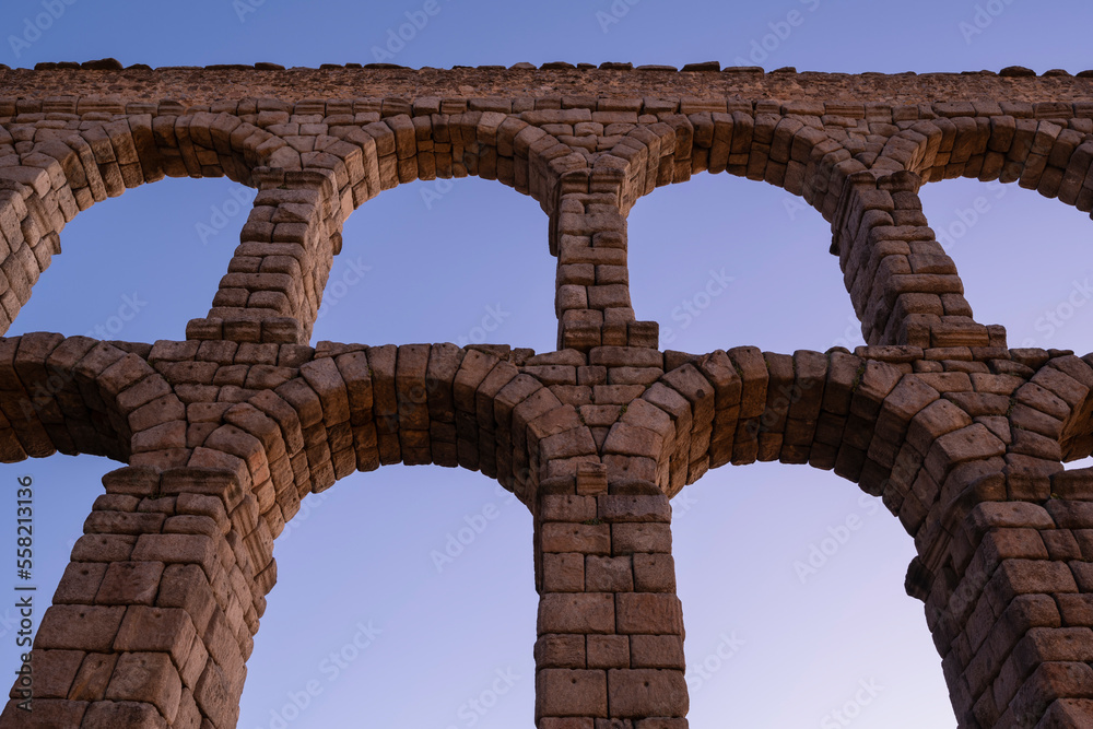 Detail of stone arches of Roman Aqueduct of Segovia, Segovia, Spain