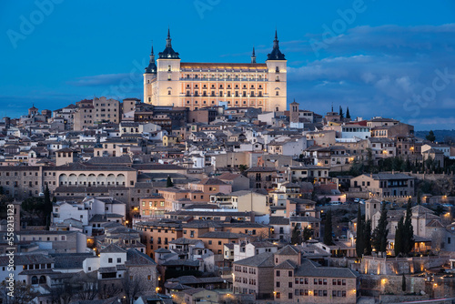 Alcazar de Toledo rises over city at dusk, Toledo, Spain © Cavan