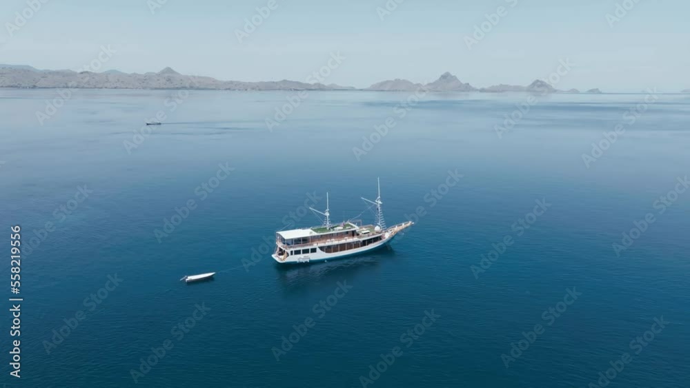 Aerial top view of a traditional boat in beautiful sea bay with turquoise crystal clear water, Aerial top view of a traditional boat in beautiful sea bay with turquoise crystal clear water,