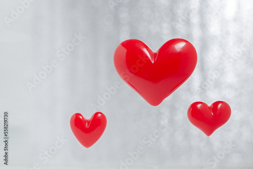 red hearts on a blurry background