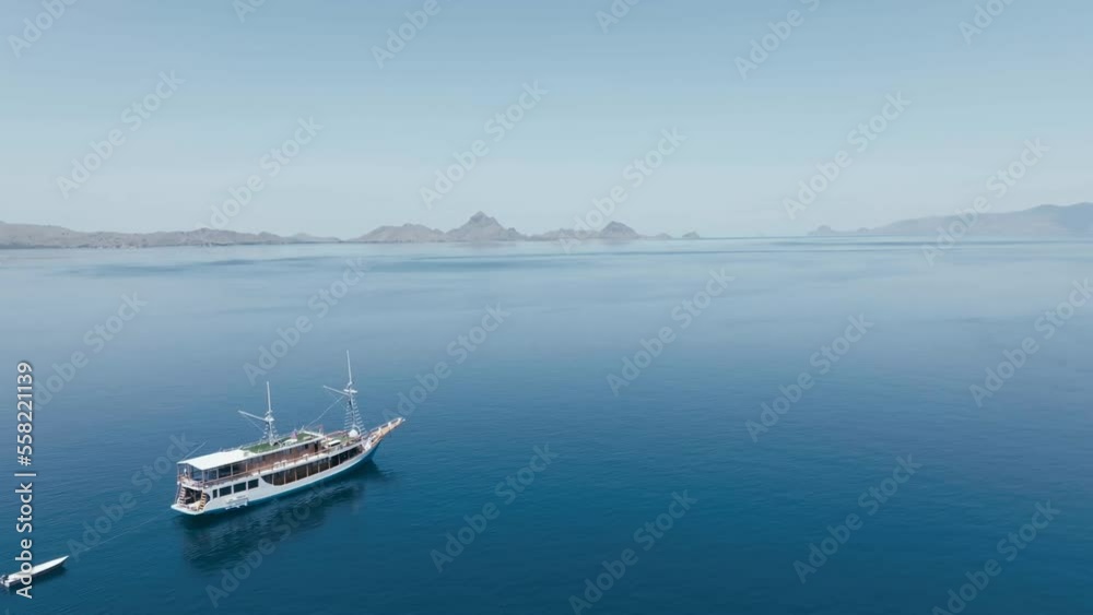 Aerial top view of a traditional boat in beautiful sea bay with turquoise crystal clear water, Aerial top view of a traditional boat in beautiful sea bay with turquoise crystal clear water,