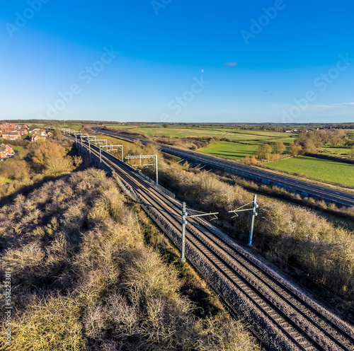 An aerial view above the Corby Viaduct on the outskirts of Corby, Northampton, UK on a bright winters day