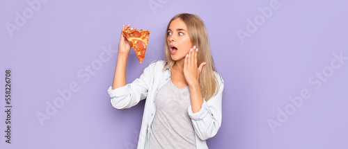 Surprised woman with slice ...