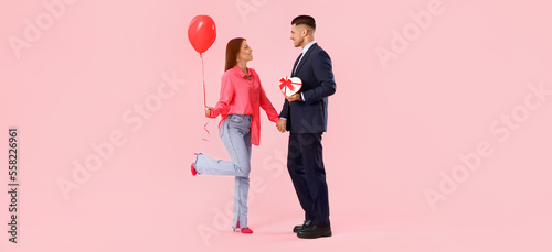 Happy young couple with gif...