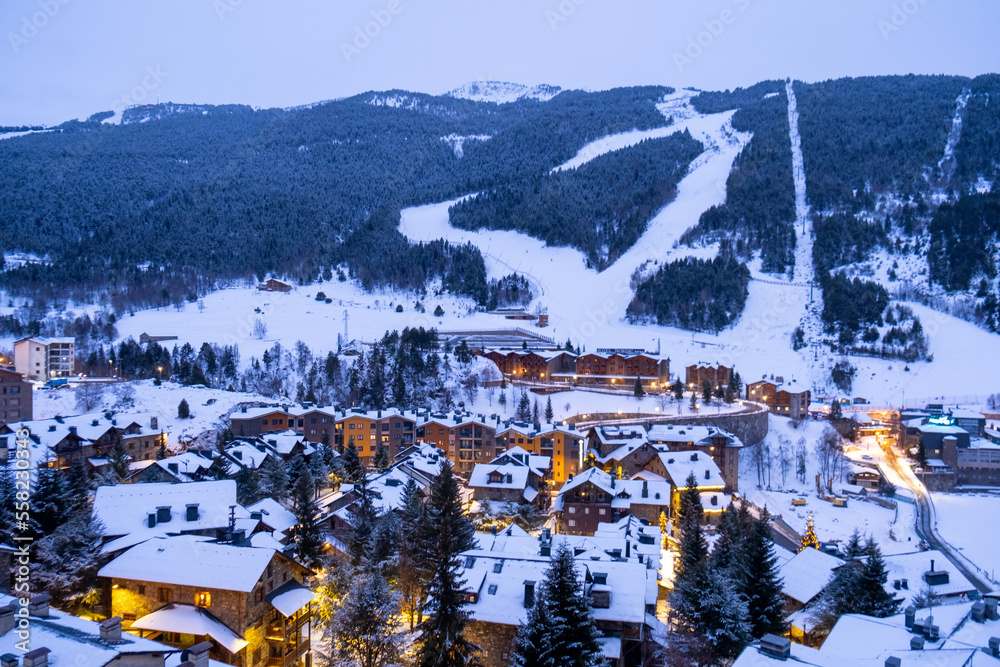 Night view of a village in Andorra in the snowy Pyrenees at night