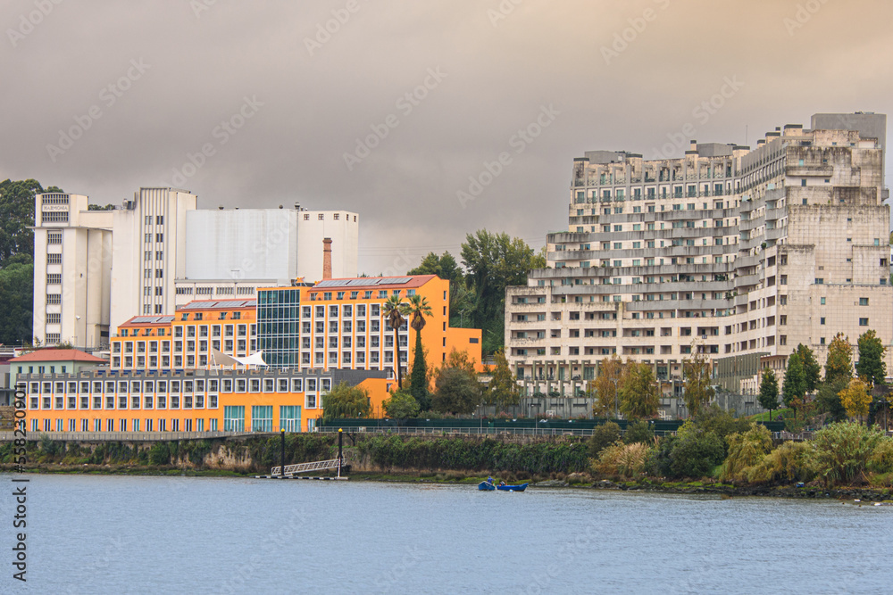 Fototapeta premium Industrial facilities along the Douro River in Portugal