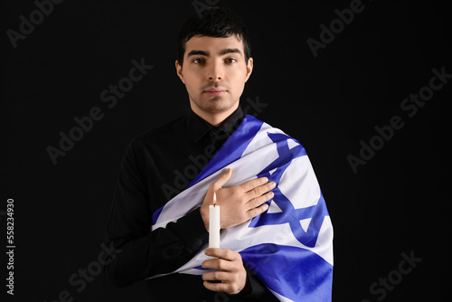 Jewish man with candle and ...