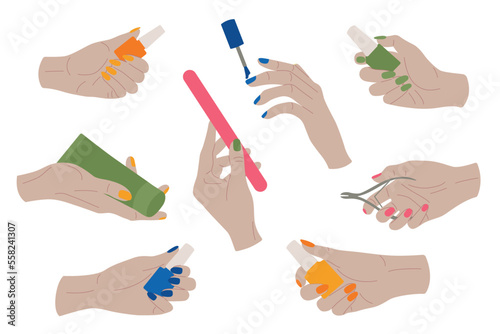 Set of hands with manicure tools and nail polish