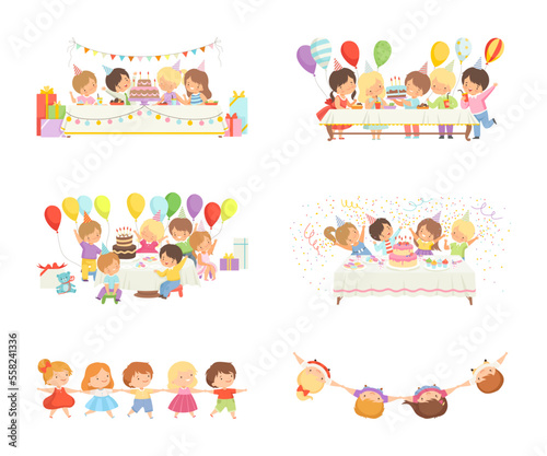 Cute happy kids celebrating holiday together. Cute boys and girls having birthday party. Children sitting at table decorated with balloons, party flags and birthday cake cartoon