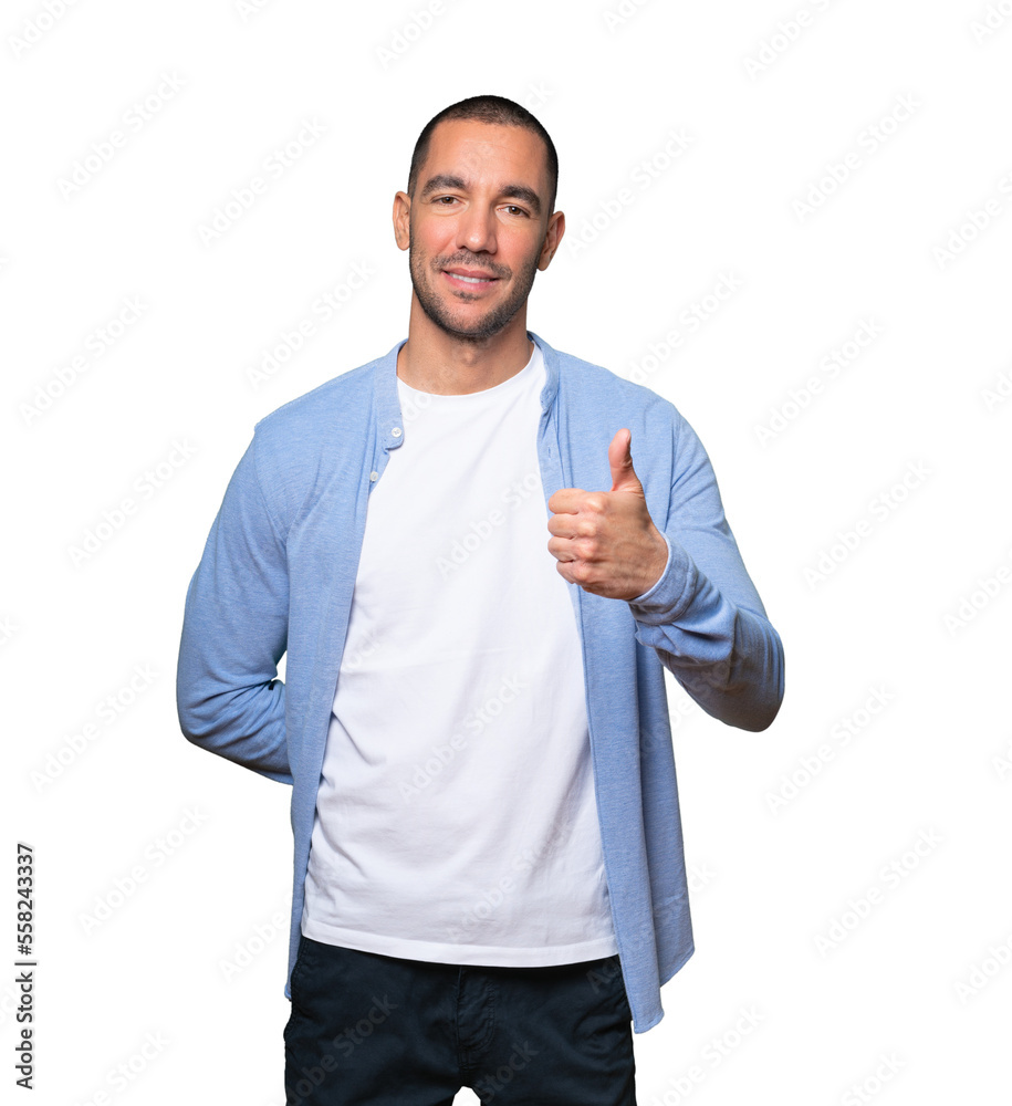 Happy young man gesturing that everything is fine Happy young man gesturing that everything is fine