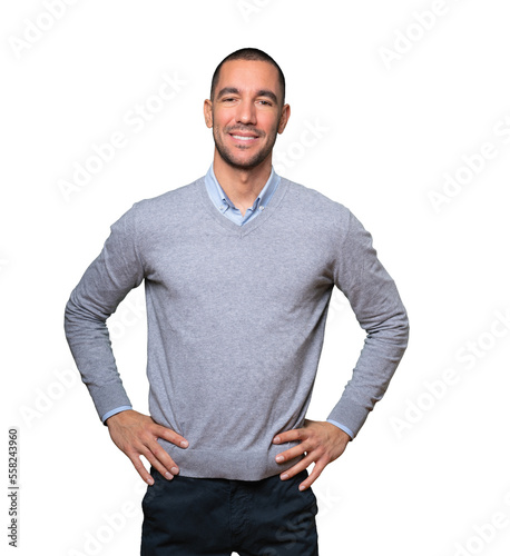 Happy young man posing against background