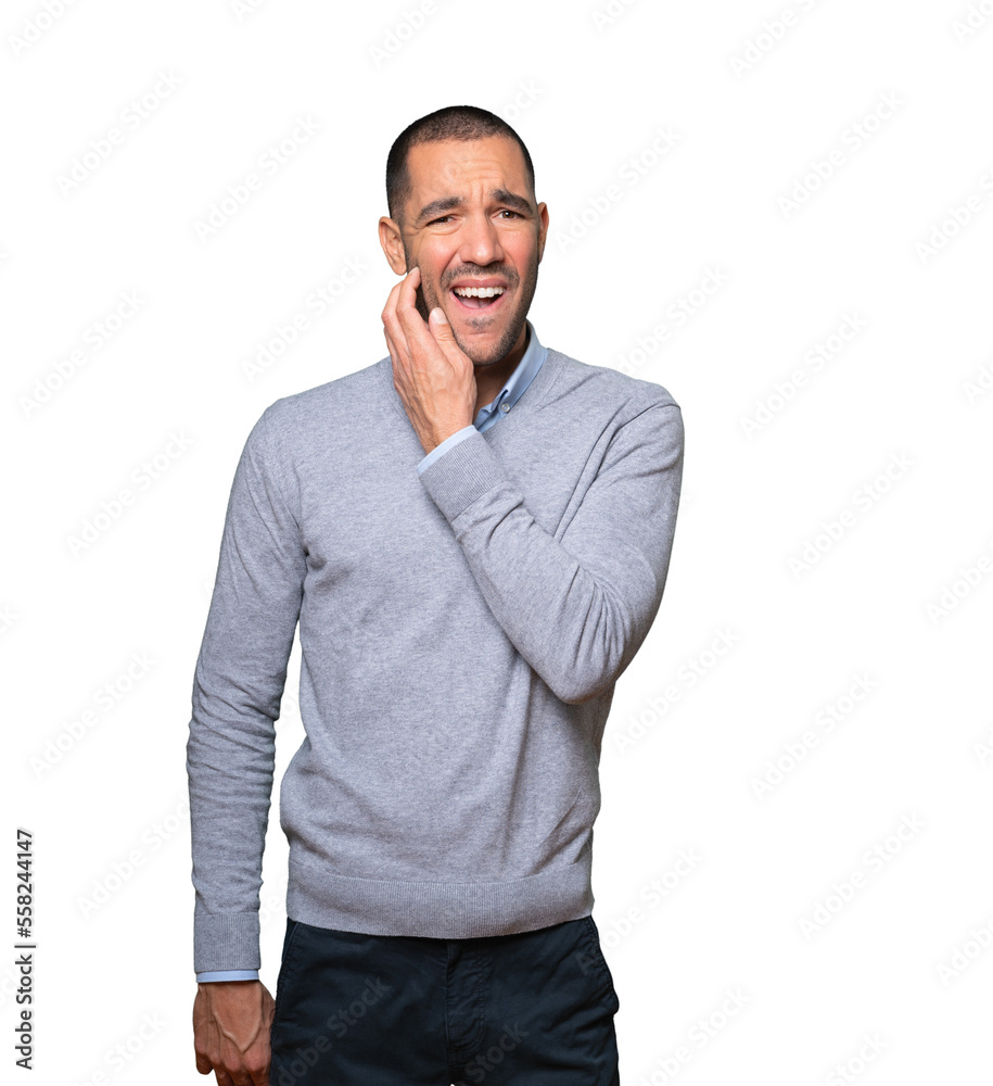Concerned young man making a scratching gesture