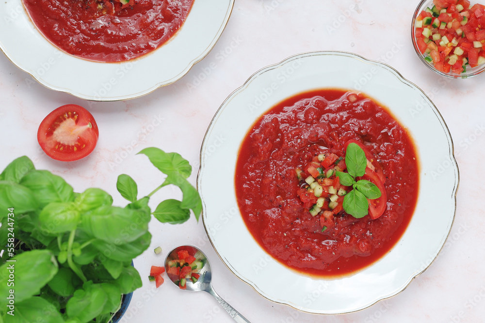 Plates with traditional gazpacho tomato soup Plates with traditional gazpacho tomato soup