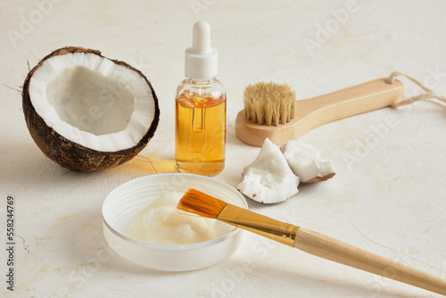 Natural organic coconut oil or serum in amber glass dropper bottle