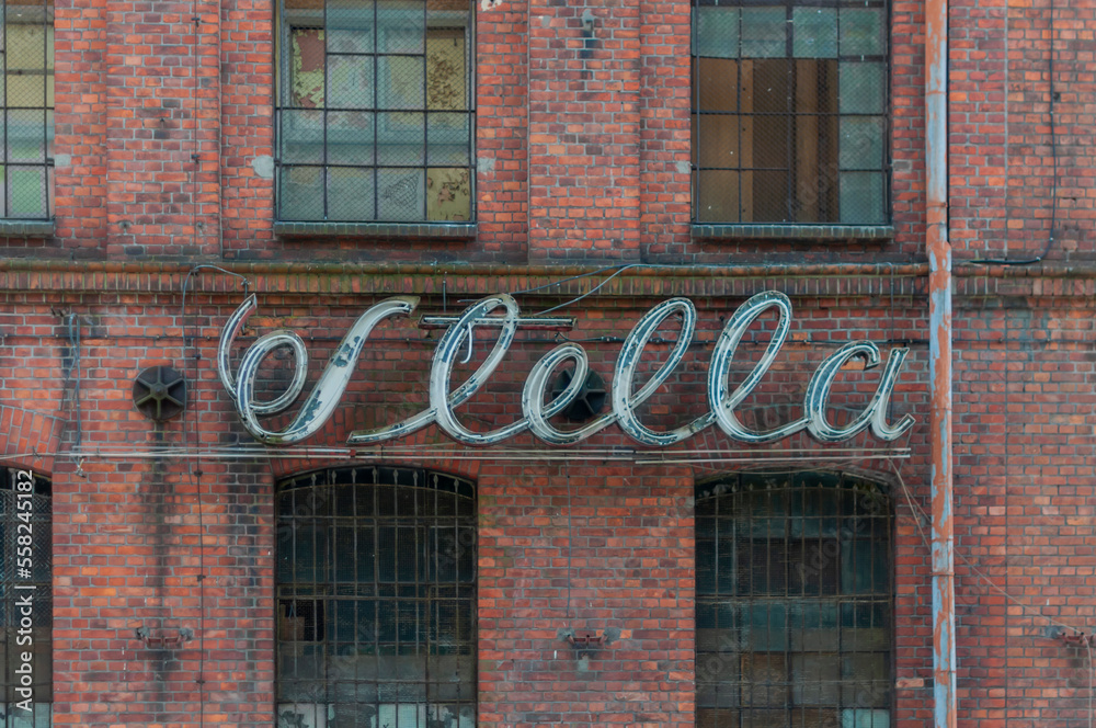 Obraz premium Old abandoned haunted red brick factory of stockings, pantyhose and socks in Central Europe, Poland