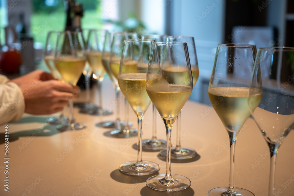 Tasting of brut and reserve champagne sparkling wine produced by traditional method in underground caves in Champagne, France Tasting of brut and reserve champagne sparkling wine produced by traditional method in underground caves in Champagne, France