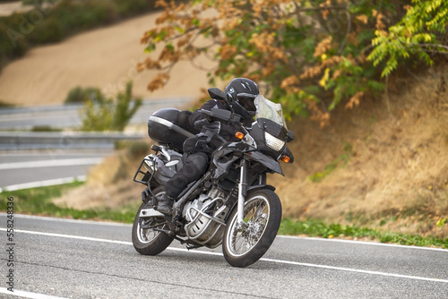 Blue Ridge Parkway, 3884 Blue Rdg Pkw Motorcycle on the road driving fast. have fun on the empty road on a motorcycle trip. copy space for individual text.