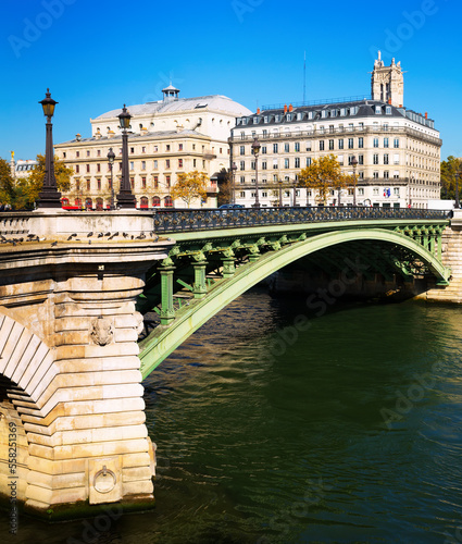 View of Pont Notre-Dame across Seine linking right bank of Paris with Ile de la Cite, France photo