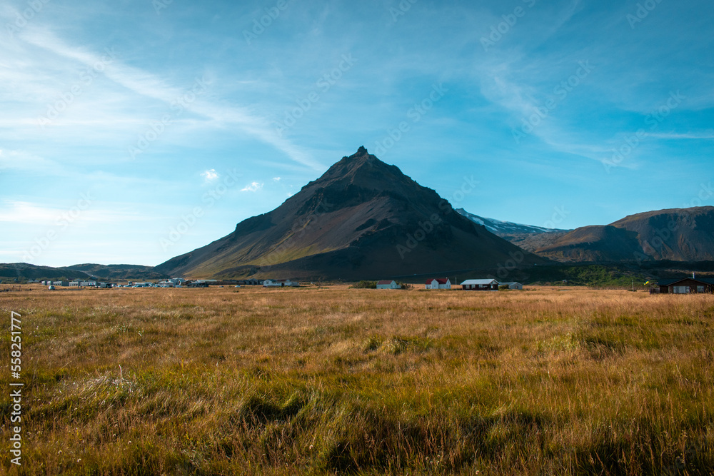 Stapafell volcanic mountain in Arnarstapi, Iceland on a sunny day Stapafell volcanic mountain in Arnarstapi, Iceland on a sunny day