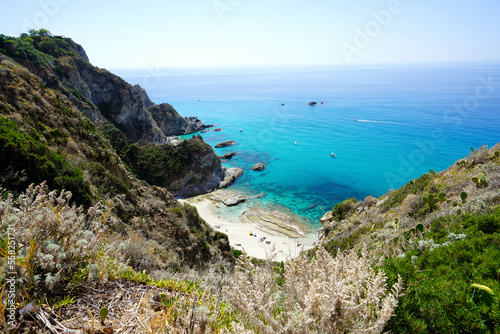 Fototapeta Naklejka Na Ścianę i Meble -  Aerial view of Praia I Focu beach on Calabria Coast, Capo Vaticano, Italy