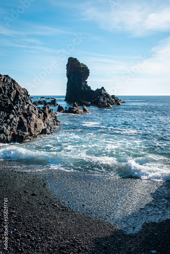 Rock formations at Djúpalónssandur black sand beach on a sunny day, Iceland photo