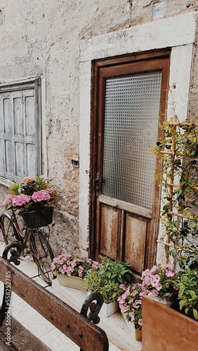 person on the window of a house