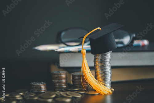 Saving money coin with banking investment, finance education concept. Planning student loan for studying abroad for college or university degree. Future children's education fund cash. Growing saving photo