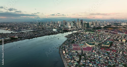 Aerial view of city of Manila with skyscrapers and business buildings at dusk. Philippines photo