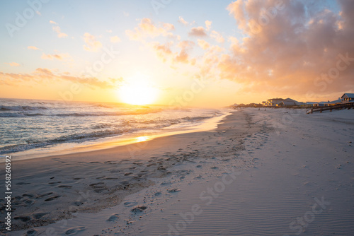 Fototapeta Naklejka Na Ścianę i Meble -  Footsteps on beach at sunset
