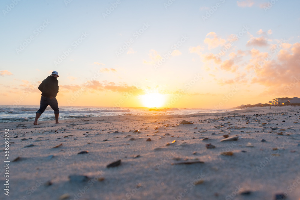 Person walking on beach