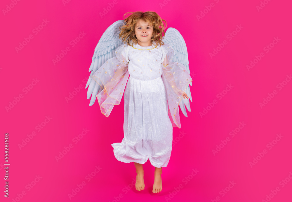 Angel child jump, kids jumping, full body in movement. Valentines day. Little cupid angel child with wings. Studio portrait of angelic kid. Angel child jump, kids jumping, full body in movement. Valentines day. Little cupid angel child with wings. Studio portrait of angelic kid.