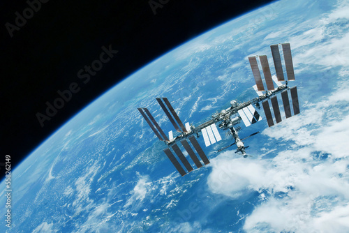 Fototapeta Naklejka Na Ścianę i Meble -  International Space Station above the Earth. Elements of this image furnished by NASA