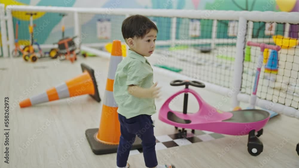 Asian children playing in an amusement park Asian children playing in an amusement park