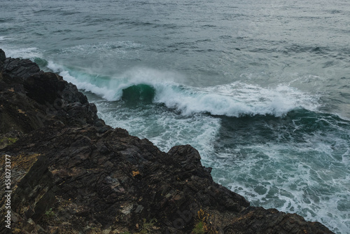 waves crashing on rocks