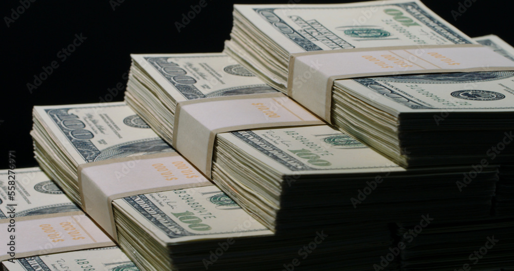 US banknote ladder. dollars bundles isolated on black background