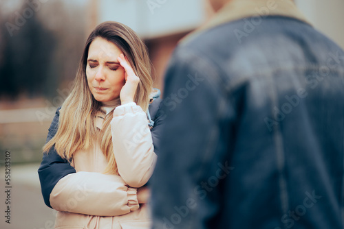 Couple Fighting Ending their Relationship on the Last Date. Husband and wife having a terrible fight outdoors 
