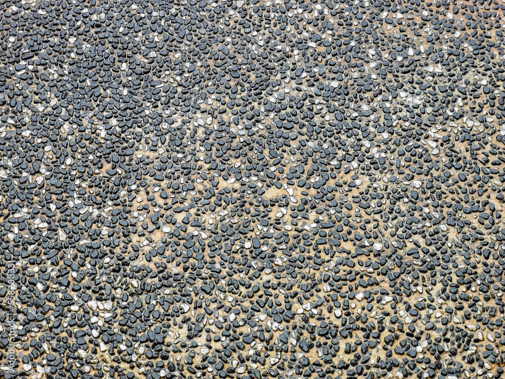Top view rough surface of small pebble stone floor. Selective focus. Top view rough surface of small pebble stone floor. Selective focus.