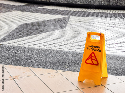 wet floor caution sign at the buiding enterance.