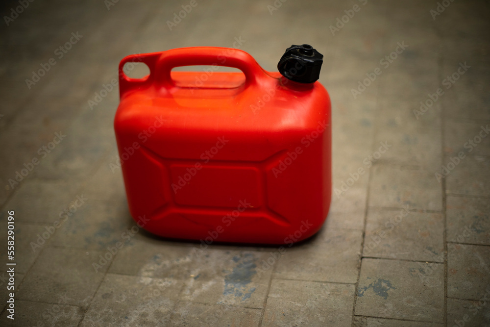 Red canister of fuel. Oil tank. Red canister of fuel. Oil tank.